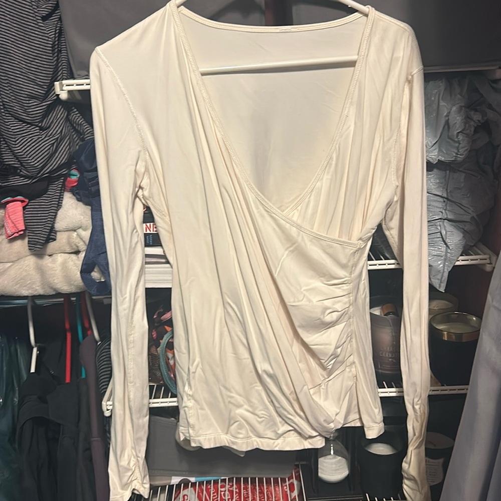 Lulu size 12 long sleeve shirt. Wrapped synch style very flattering.